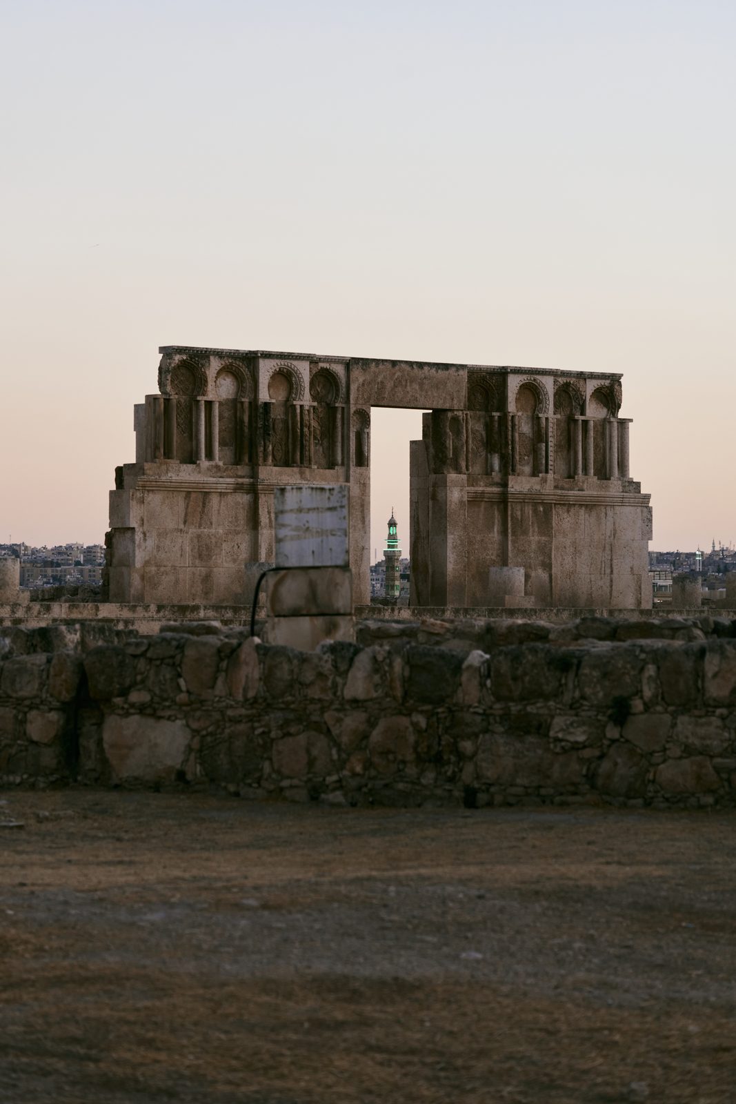 Stone ruin with an arched opening in late light
