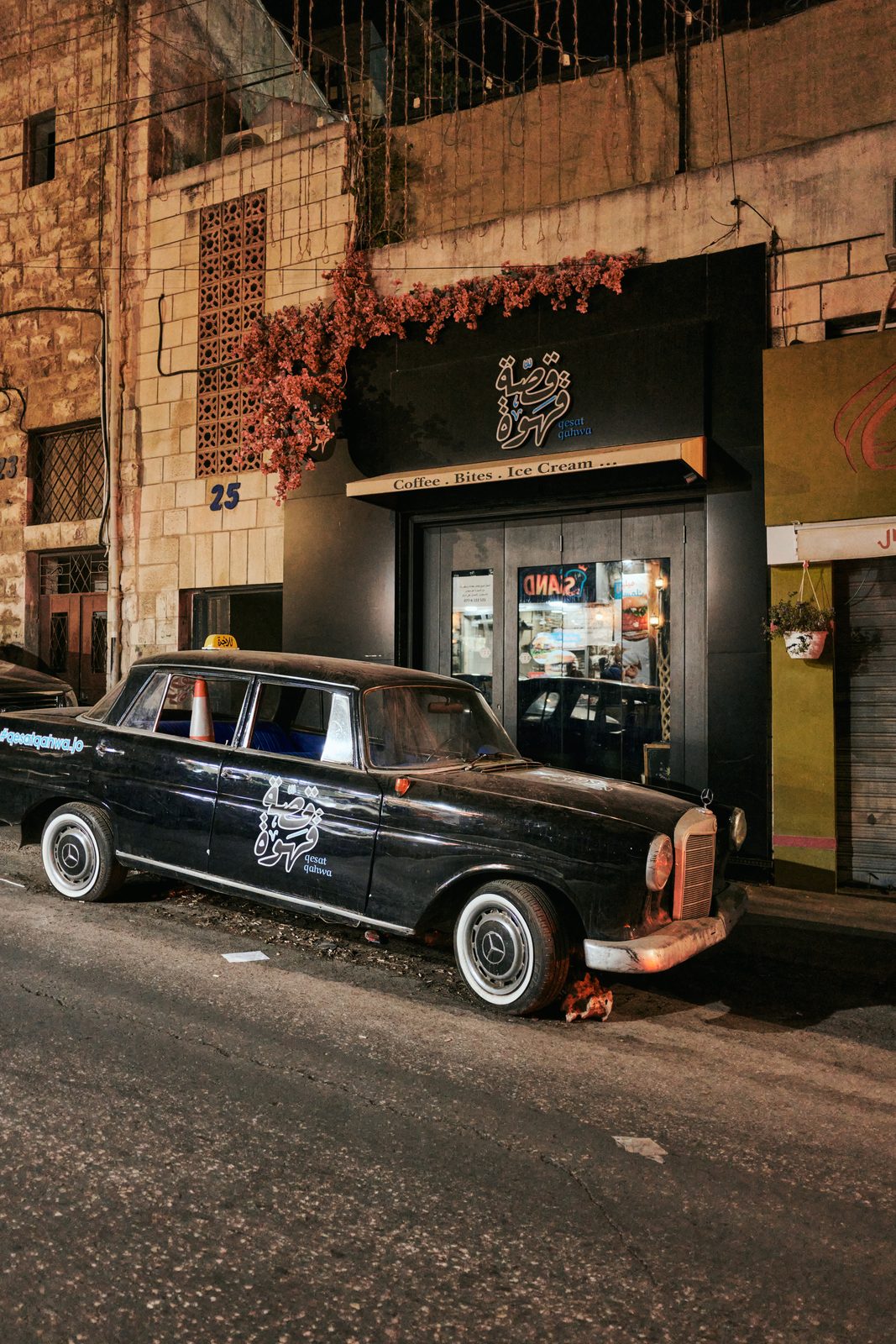 Old Mercedes parked on a night street