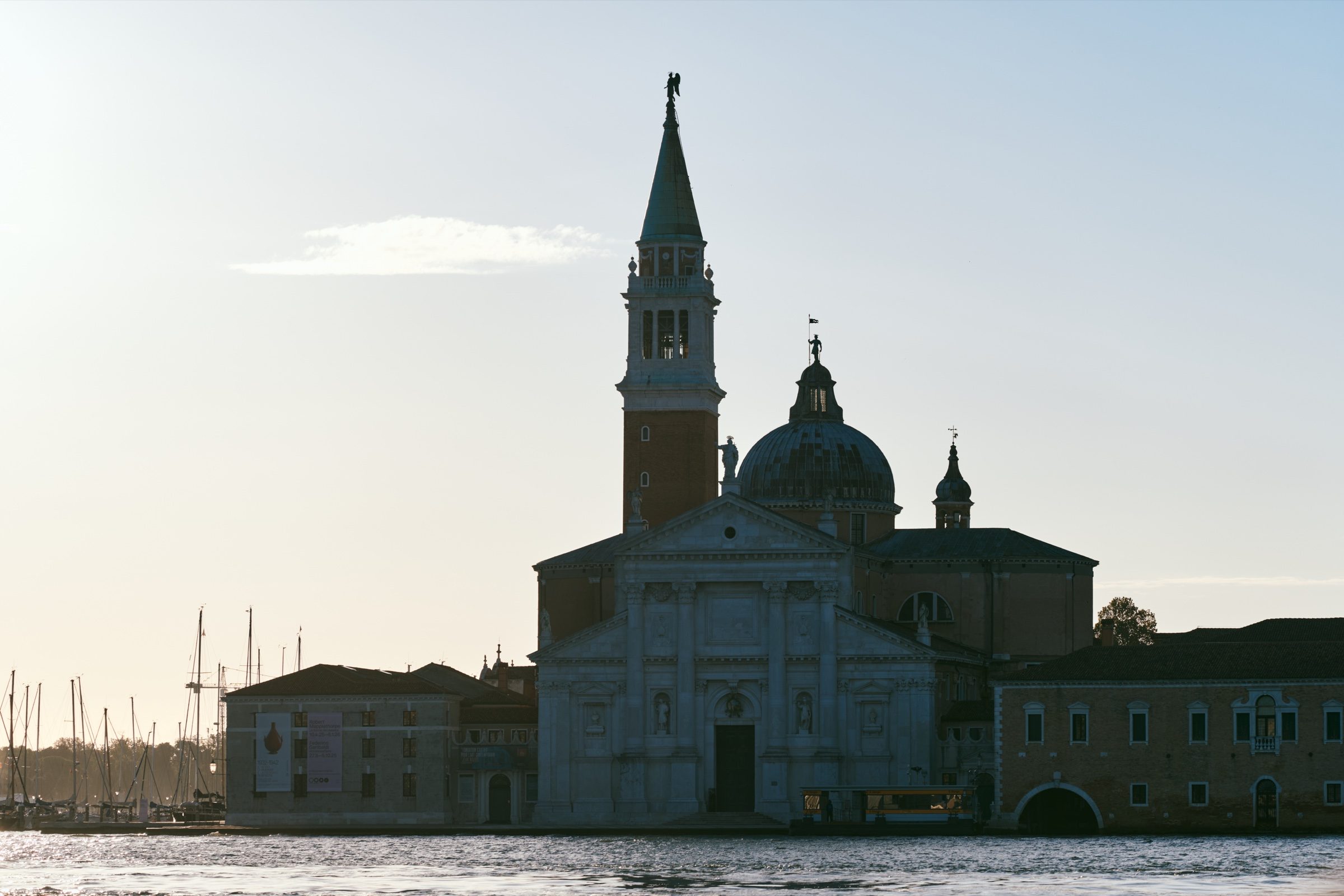 San Giorgio Maggiore with its campanile and dome across the water in evening light, Venice