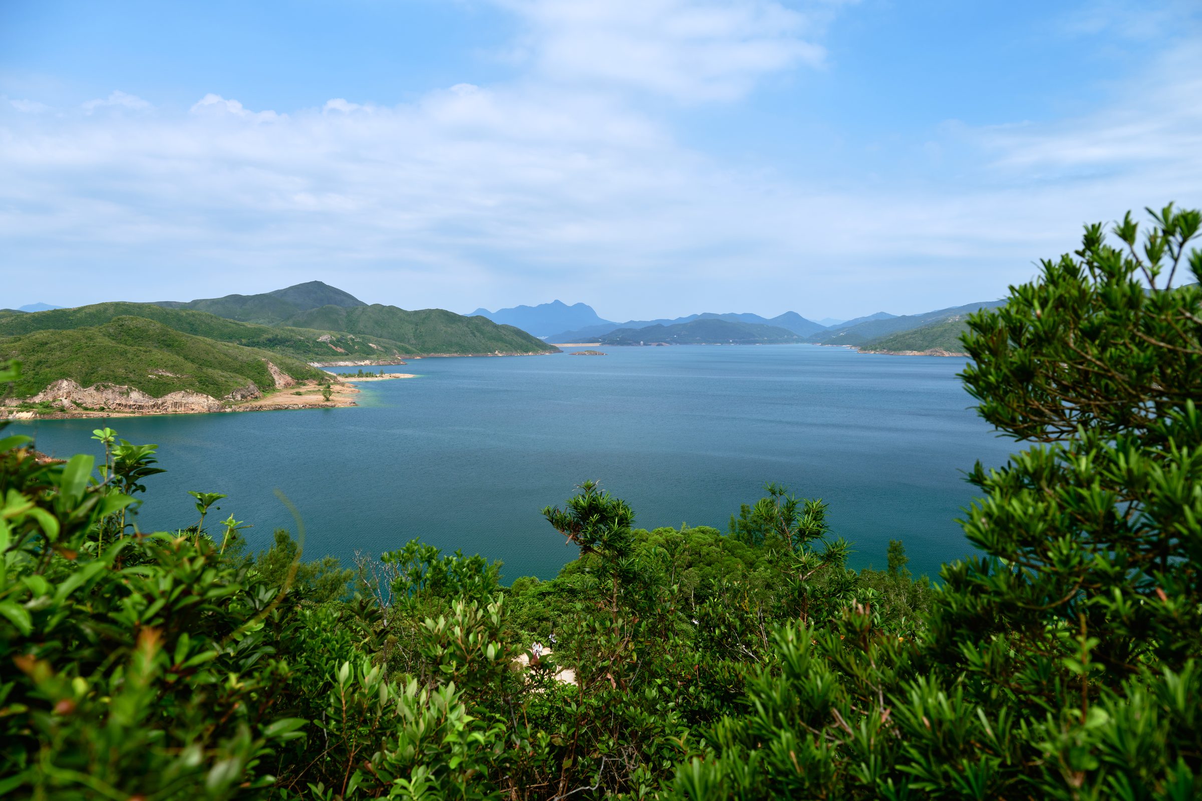 View over High Island Reservoir and green hills from the MacLehose Trail, Sai Kung, Hong Kong