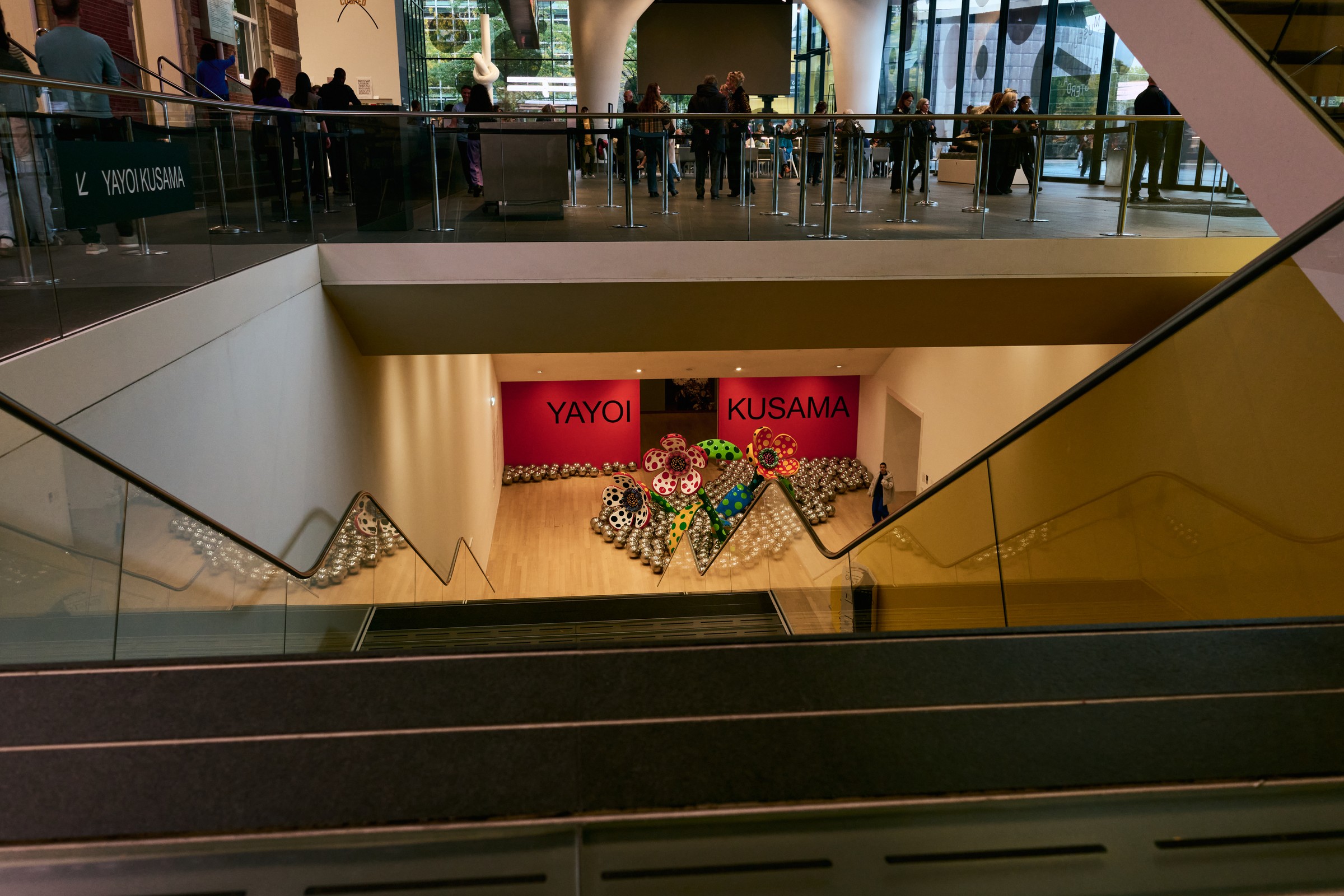 Atrium and entrance to the Yayoi Kusama exhibition seen from the staircase, Stedelijk Museum Amsterdam