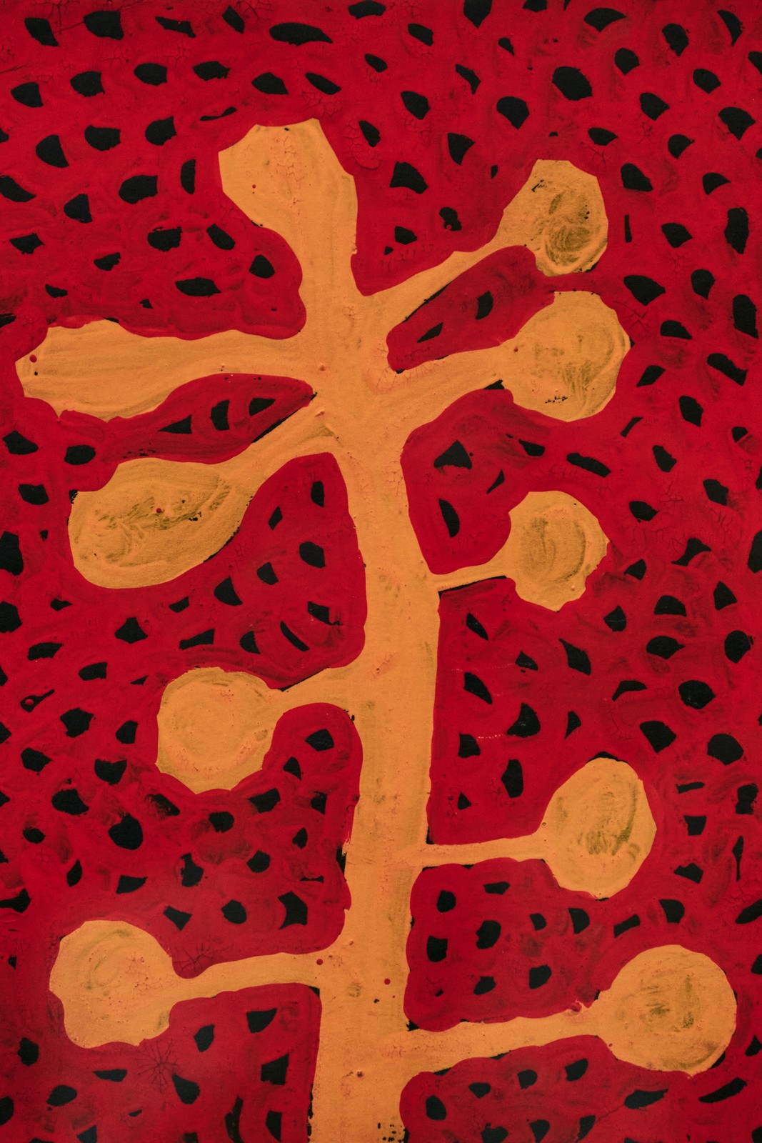 Detail of a red-and-yellow branch painting with black dots by Yayoi Kusama, Stedelijk Museum Amsterdam